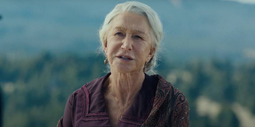 Helen Mirren as Cara Dutton in 1923 talking in front of blue backdrop
