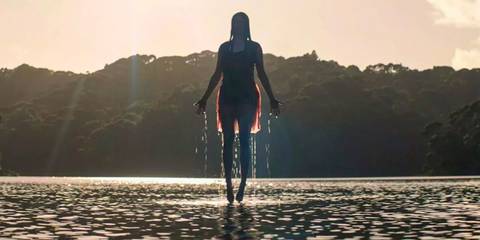 Jessica rising out of the water in Evil Dead Rise