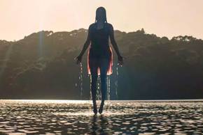 Jessica rising out of the water in Evil Dead Rise
