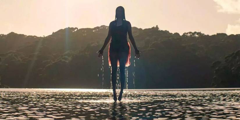 jessica rising out of the water in evil dead rise