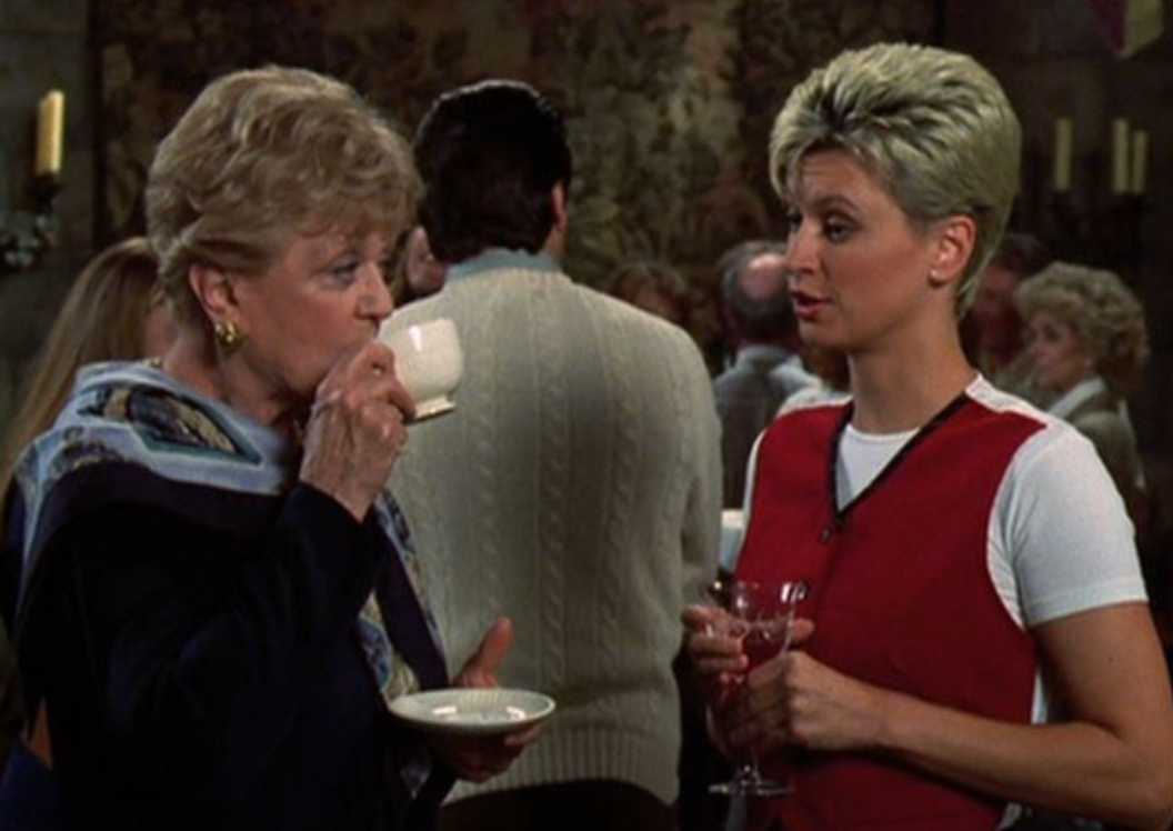Jessica sips from a teacup in the Murder She Wrote episode Nans Ghost