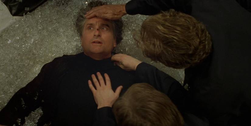 Michael Douglas lying on broken glass in The Game