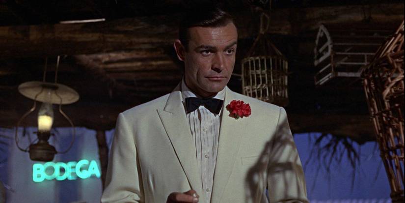 Sean Connery as James Bond in a white tuxedo in Goldfinger