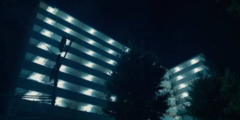 Trees in front of a building during Tag in Alice in Borderland.