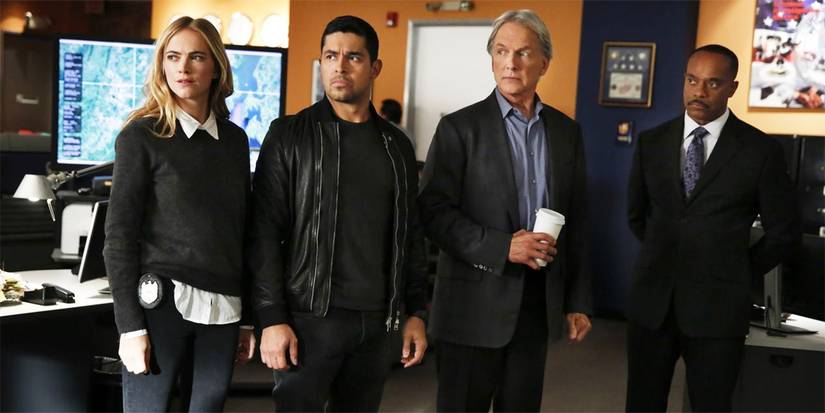 Bishop, Torres, Gibbs, and Vance standing in the bullpen on NCIS