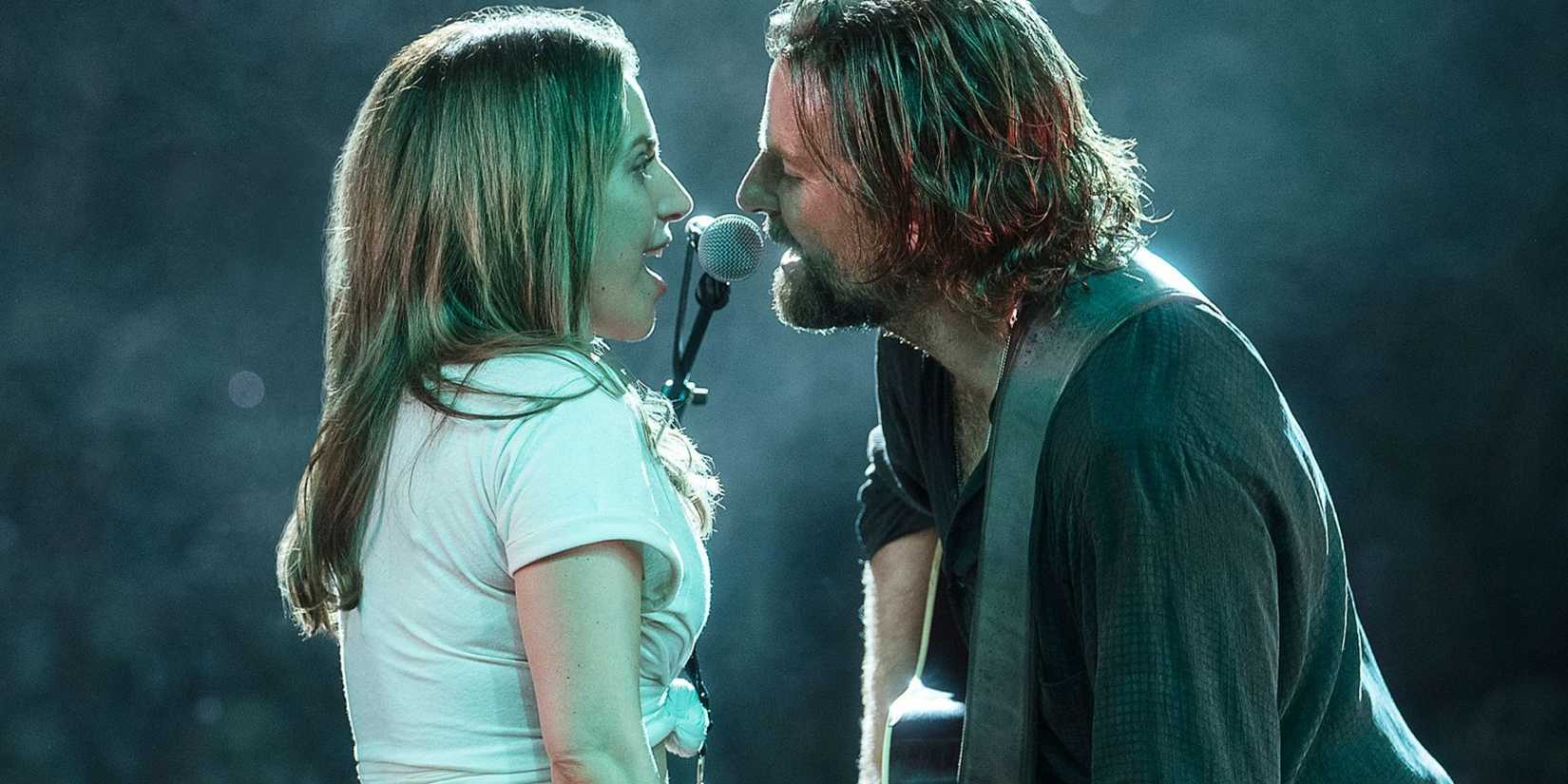 Lady Gaga and Bradley Cooper as Ally and Jackson singing on stage in A Star Is Born
