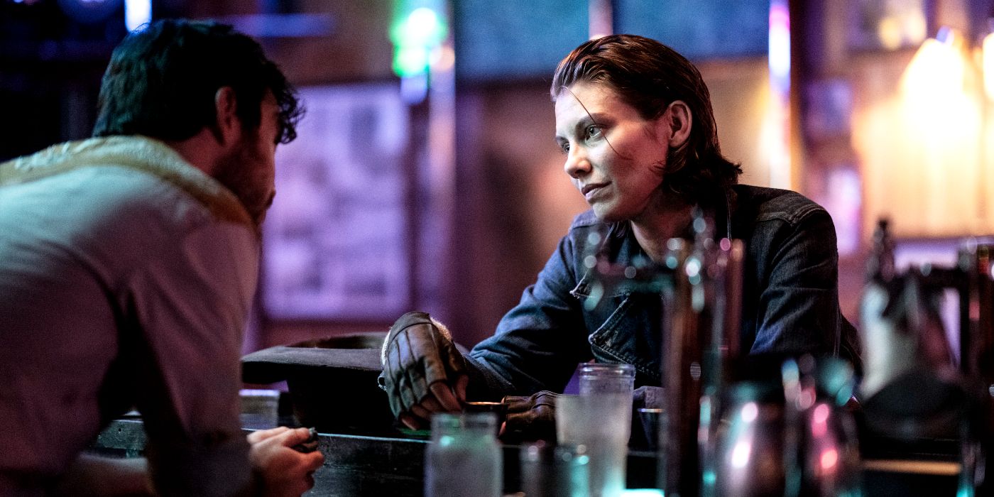 An image of Maggie sitting at a bar in a leather jacket in The Walking Dead: Dead City