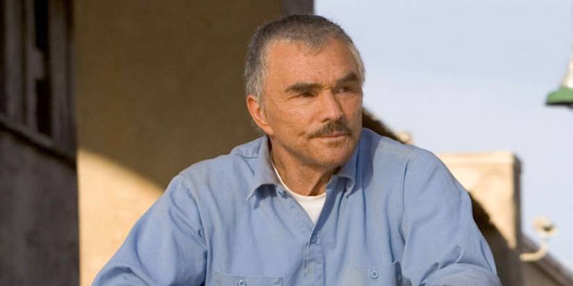 Burt Reynolds looking into the distance in The Longest Yard