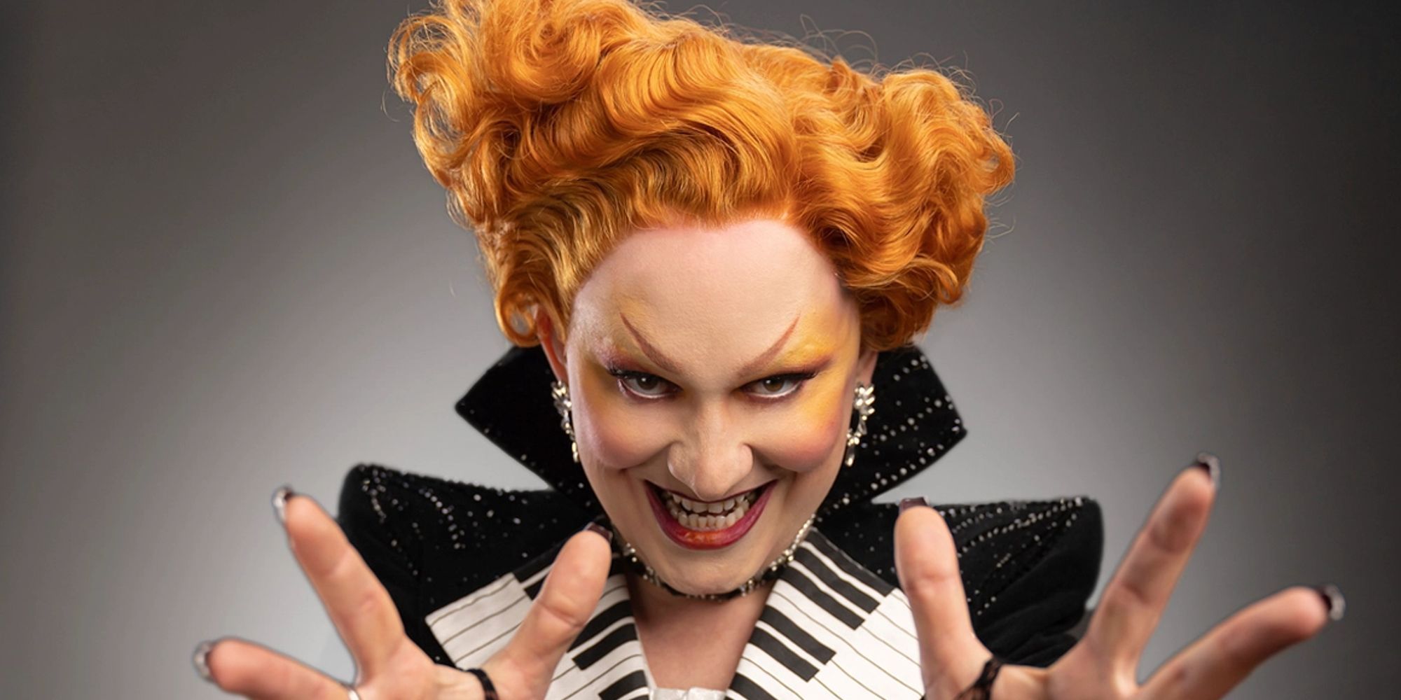 Jinkx Monsoon In a piano-style costume in Doctor Who season 14.