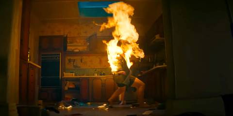 Deadite Bridget on Fire in Evil Dead Rise 