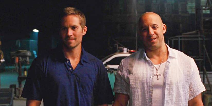 Paul Walker e Vin Diesel em cena de Velozes e Furiosos 5.