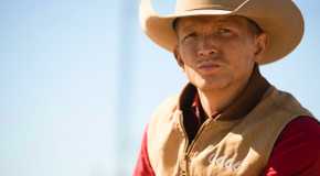 Jimmy looking into the distance in while wearing his 6666 sweater in Yellowstone