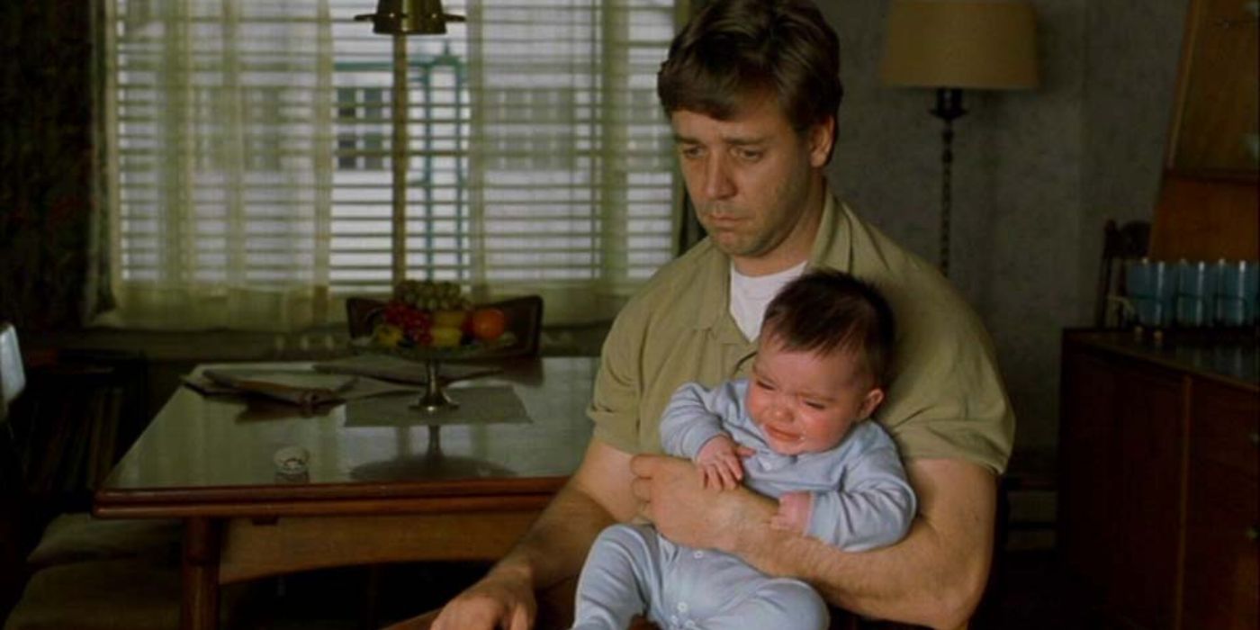 John Nash holding a baby in A Beautiful Mind
