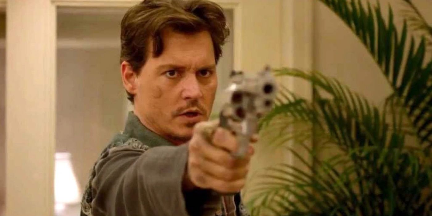 Johnny Depp pointing a gun in 21 Jump Street