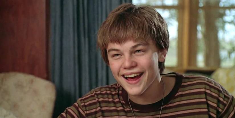 Arnie Grape (Leonardo DiCaprio) smiling and laughing in What's Eating Gilbert Grape (1993)