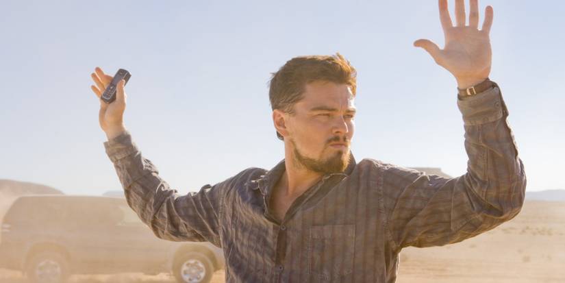 Leonardo DiCaprio in Body of Lies con le mani alzate
