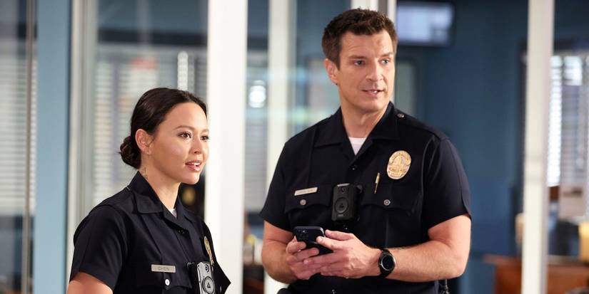 Lucy and John standing together on The Rookie