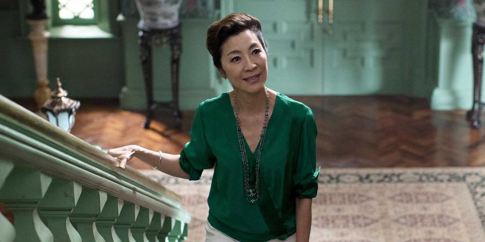 Michelle Yeoh on the stairs in Crazy Rich Asians