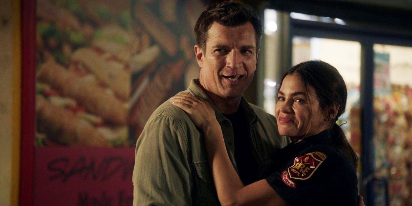 Nolan (Nathan Fillion) and Bailey (Jenna Dewan) hugging on The Rookie.