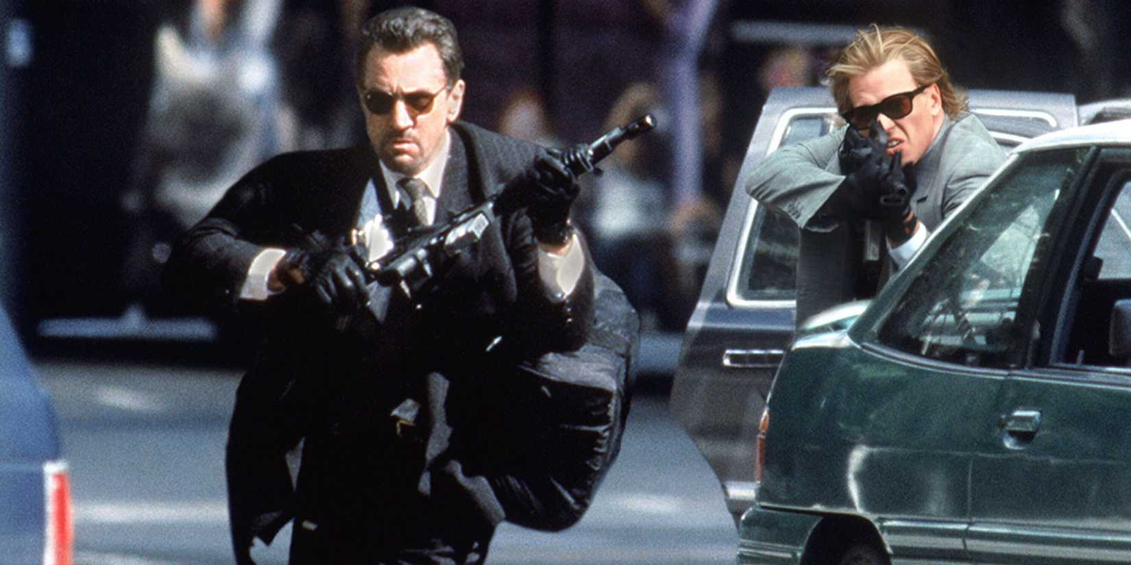 Robert De Niro as Neil McCauley and Val Kilmer as Chris Shiherlis in a shootout with the LAPD in Downtown LA in Heat