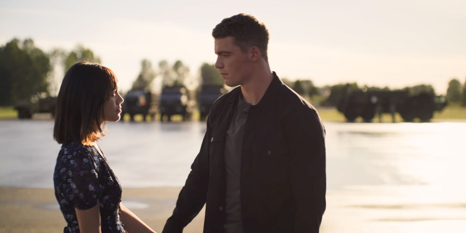 Rose and Peter saying goodbye in front of a convoy of trucks in The Night Agent