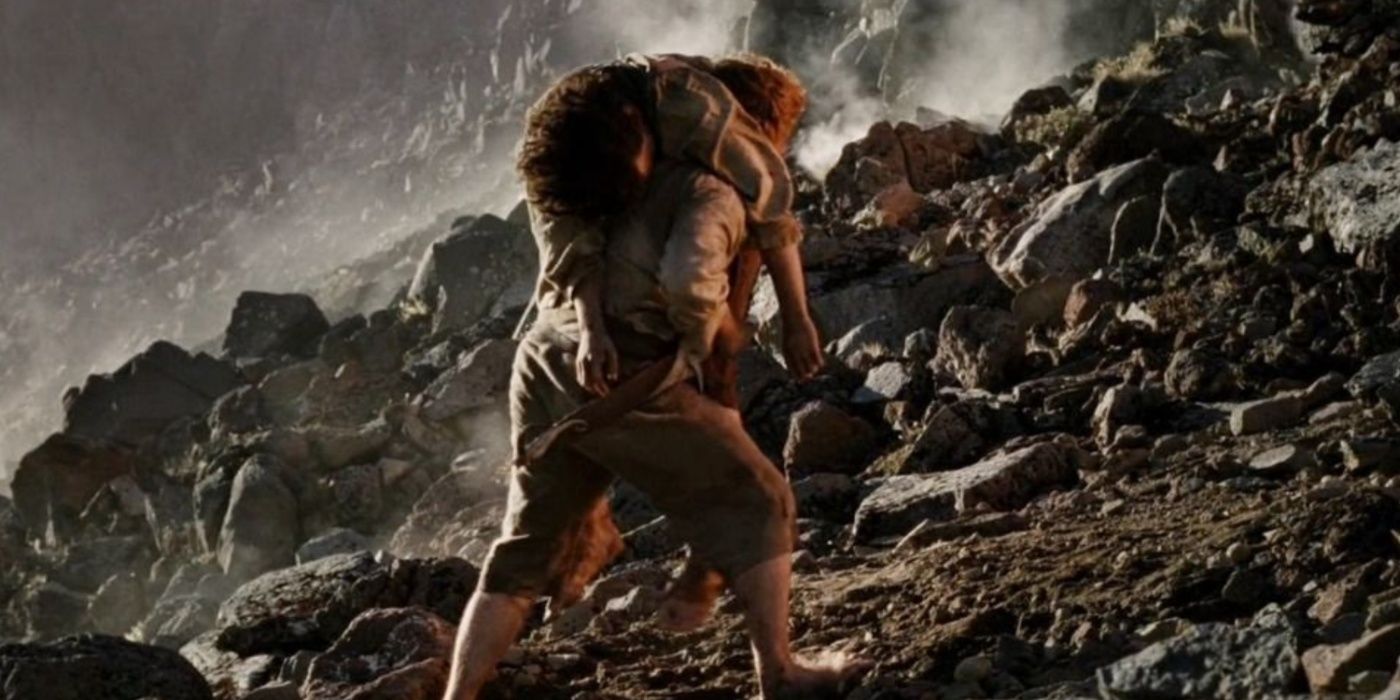 Sam (Sean Astin) carries Frodo (Elijah Wood) up the slopes of Mount Doom in The Lord of the Rings: The Return of the King