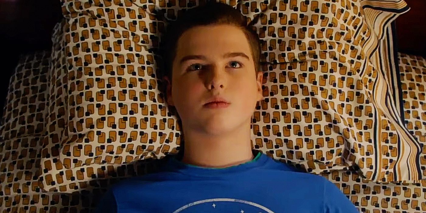 Sheldon laying in his bed staring at the ceiling in Young Sheldon season 6