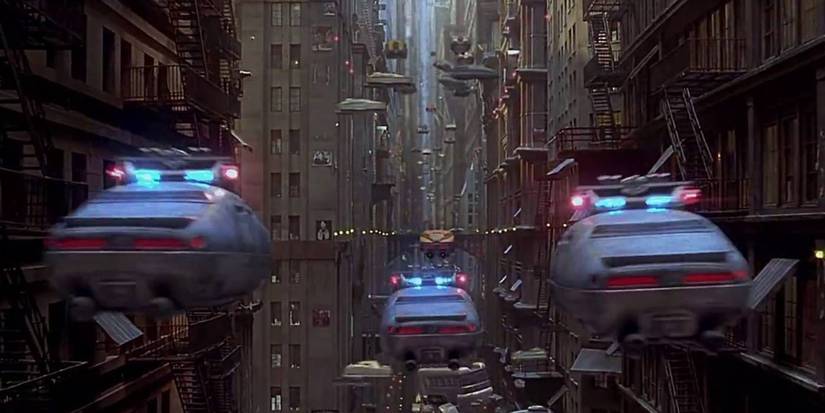 Flying police cars chasing a taxi cab in the city in The Fifth Element