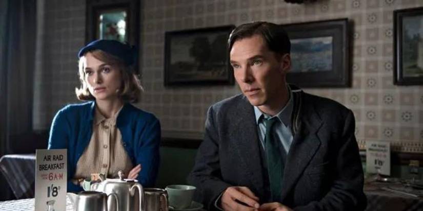 Alan Turing an Joan Clarke sitting at a table in The Imitation Game
