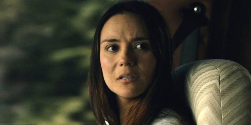 Catalina Sandino Moreno as Tabitha Matthews in a car looking scared in From.