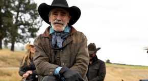 Forrie J Smith as Lloyd Pierce sitting on a horse in Yellowstone.