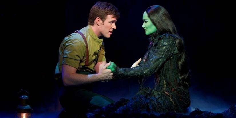Elphaba and Fiyero holding hands during 