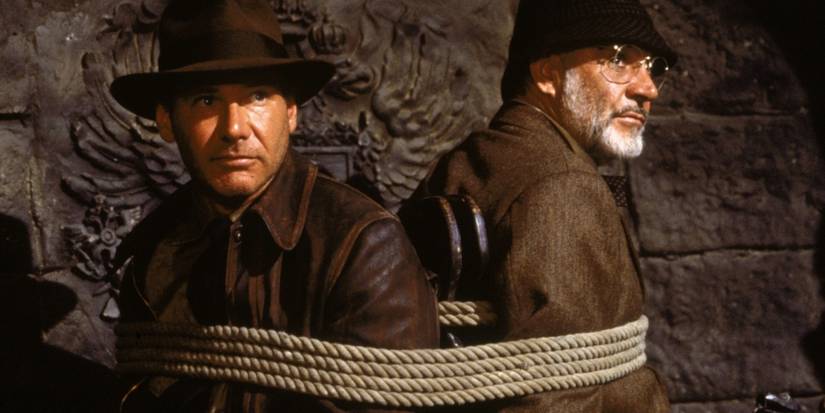 Harrison Ford e Sean Connery amarrados em Indiana Jones e a Última Cruzada