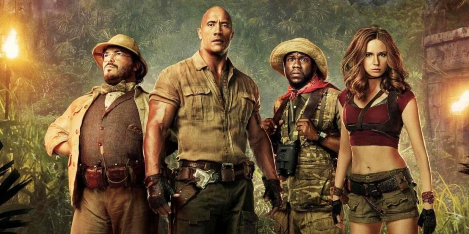 Jack Black, Dwayne Johnson, Kevin Hart, and Karen Gillan standing together in Jumanji