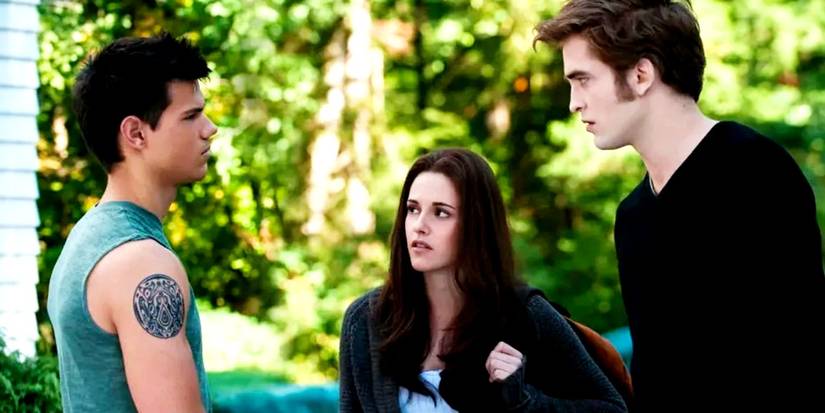 Jacob, Bella, and Edward looking at each other in Twilight New Moon.