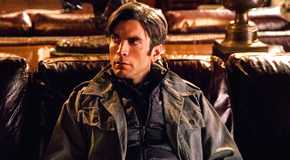 Jamie Dutton in sitting on a couch looking right in Yellowstone season 5