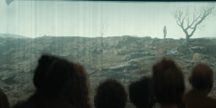 Juliette staring back at the Silo in Silo season 1's ending