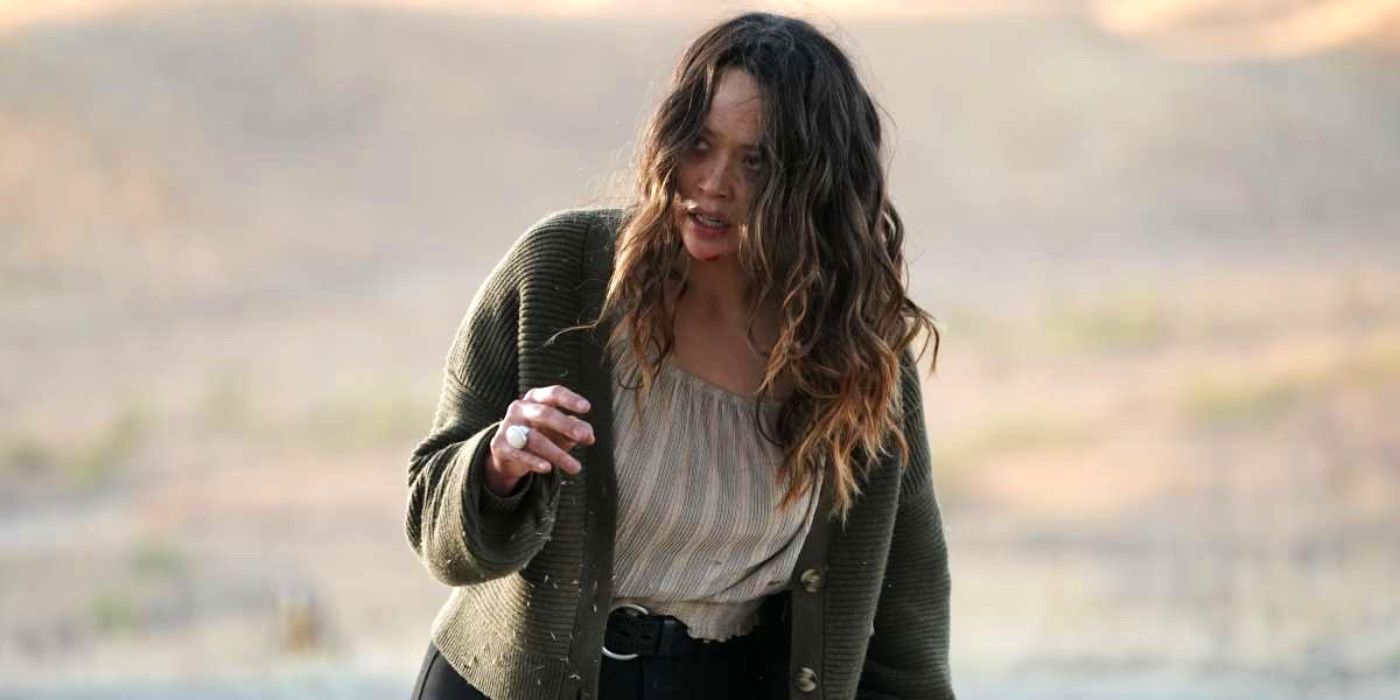 Lucy (Melissa O'Neil) looking disheveled and struggling to remain standing in The Rookie