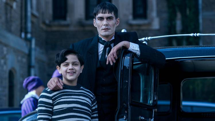 Lurch and Pugsley standing by the car on Wednesday