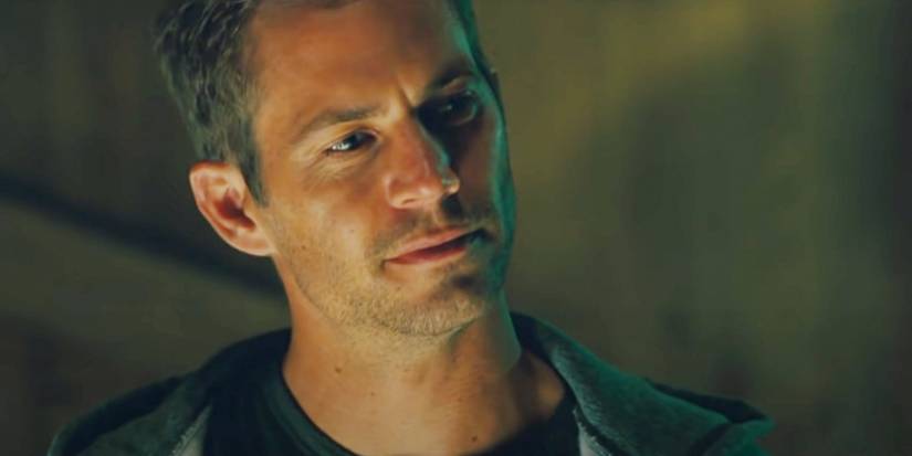 Paul Walker as Brian smirking in Furious 7