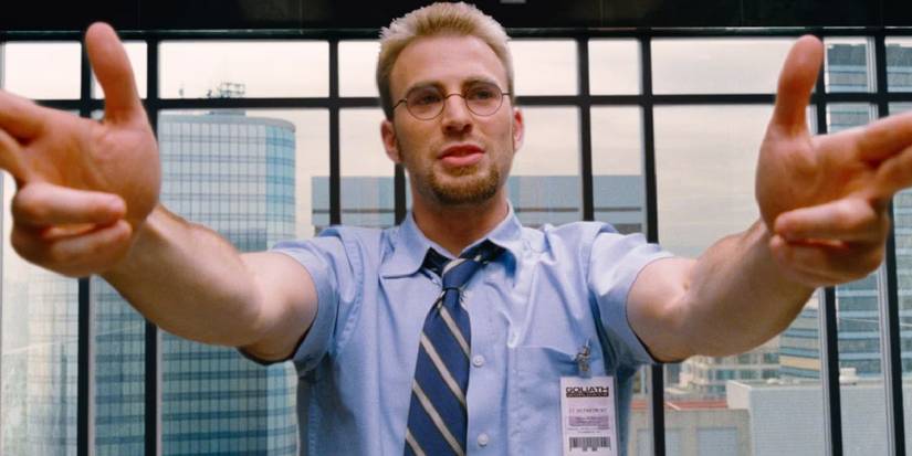 Chris Evans holds up finger guns in The Losers