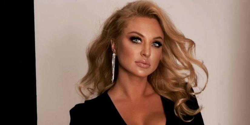 90 Day Fiancé Natalie Mordovtseva glamorous photo shoot in black dress