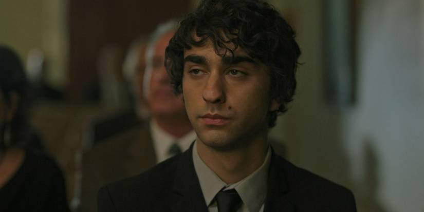 Alex Wolff at a funeral in Hereditary