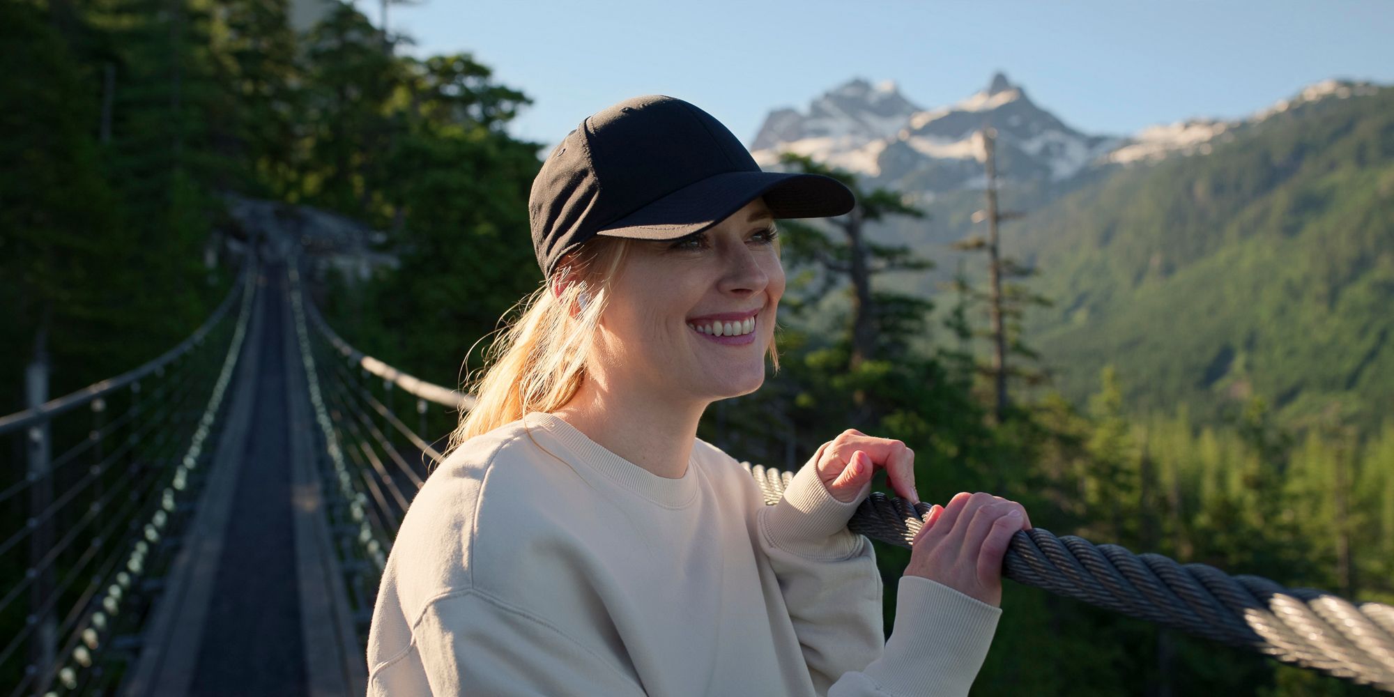 Alexandra Breckenridge in Virgin River season 5 walking on a bridge