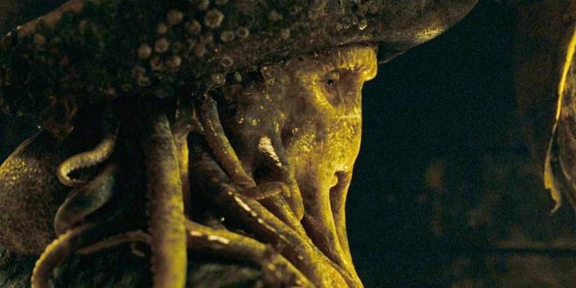 An image of Davy Jones looking at someone from the side in Pirates of the Caribbean