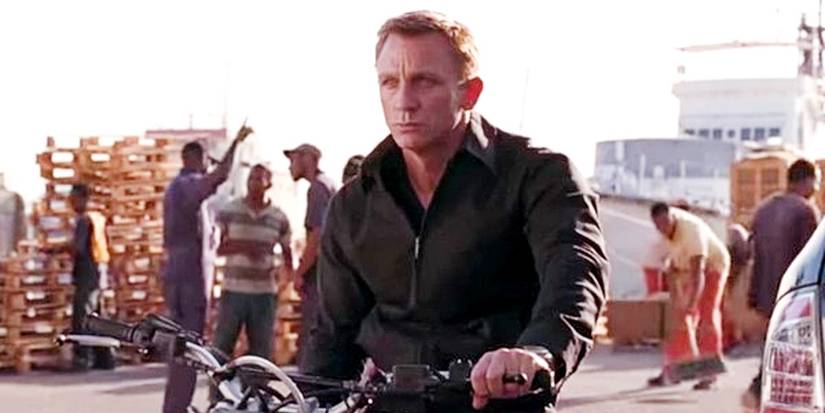 An image of Daniel Craig as James Bond sitting on a bike in Quantum of Solace