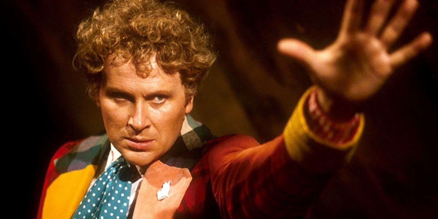 Colin Baker reaching out in Doctor Who