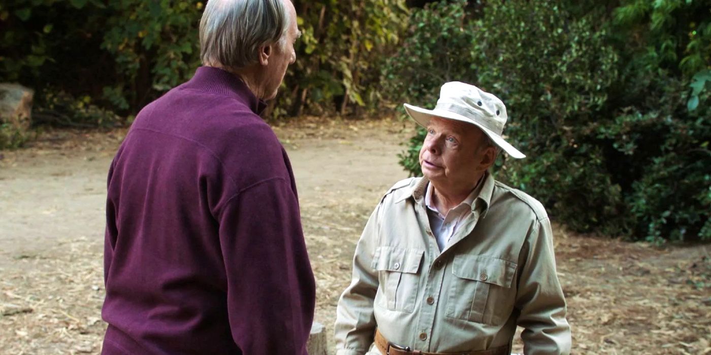 Dale and Sturgis argue at a camp site on Young Sheldon