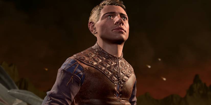 A male halfling looks worried as he stares out over Avernus in Baldur's Gate 3