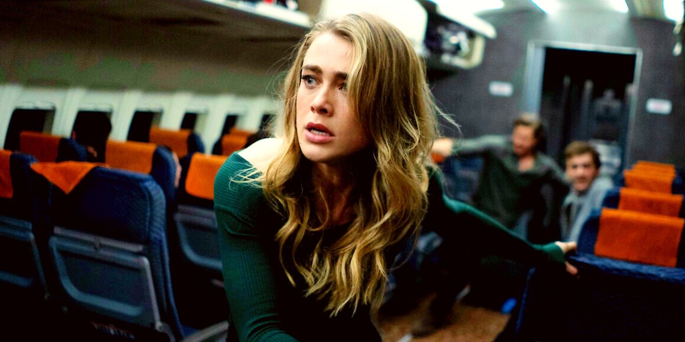 Melissa Roxburgh looking alarmed while in the airplane aisle in Manifest season 4